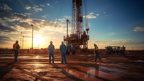 A drilling rig manned by engineers and oil field workers preparing to explore a new petroleum reservoir.