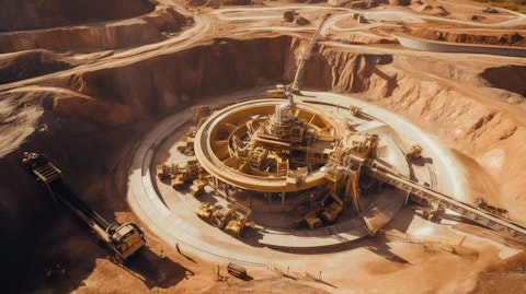 Aerial view of modern machinery operating in a gold mining site.