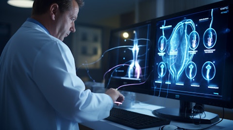 A doctor using a Lumivascular platform to get a closer look at the patient's peripheral arterial disease.