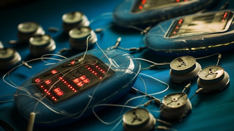 A close-up view of medical devices, electrical stimulation electrodes, and batteries.