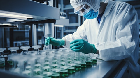 A lab technician testing samples of regenerative solutions in an advanced lab setting.
