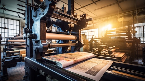 A high tech printing press, producing professional-grade physical books.