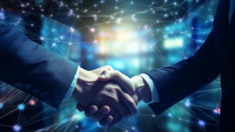 An executive shaking hands with a customer as they seal a major Identity Verification Services deal.