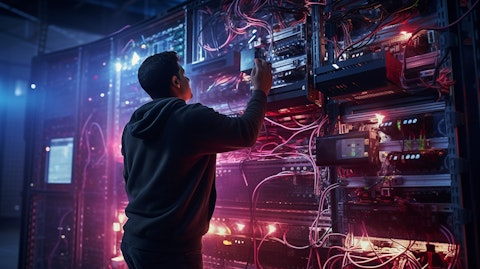 A professional lighting technician installing a retail display with an array of sensors and photocontrols.