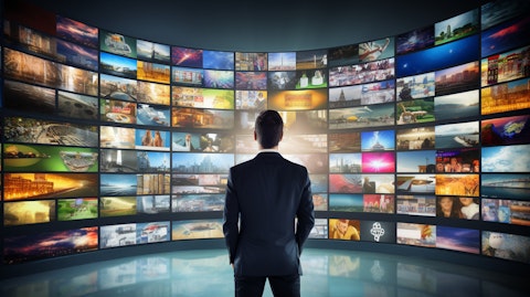 A large flat-screen TV streaming video from a video hosting platform.
