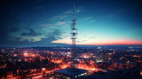 A telecom tower in a city skyline indicating the companys expansive reach.