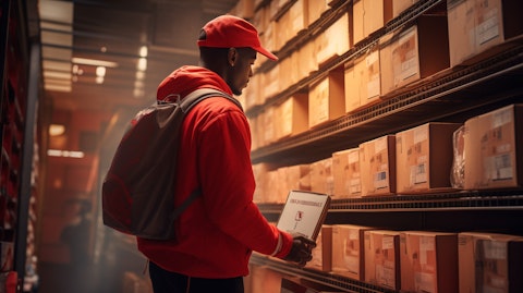 A deliveryman dropping off a package beside a rack of consumer packaged goods.