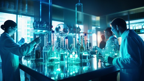 A Pharmaceutical research and development team in a lab analyzing a test in progress.
