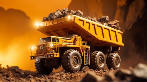 A mining truck hoding a payload of mineral ore, a visual representation of the companies resources.