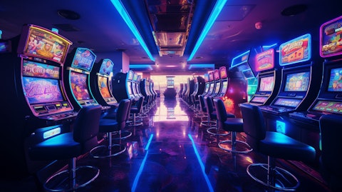 An interior shot of a gaming operators facility, gaming machines reflecting the lights.