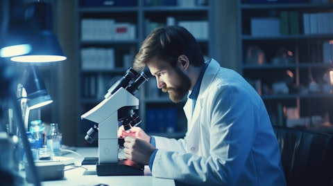 A doctor in a lab coat looking through a microscope, researching the latest drugs.