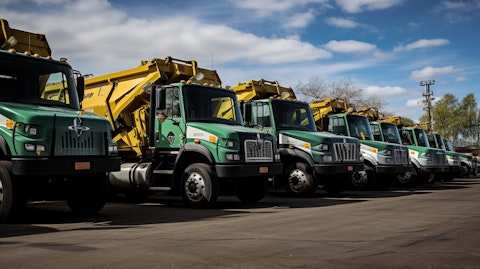 A fleet of waste management vehicles, signifying the company's efficient services.