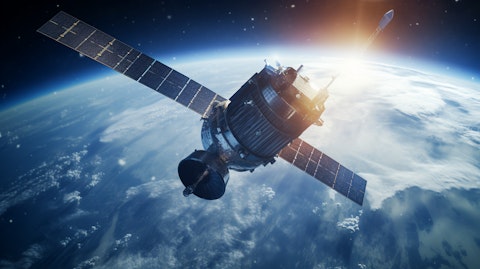 A powerful satellite in the stratosphere sending and receiving signals for the company's services.