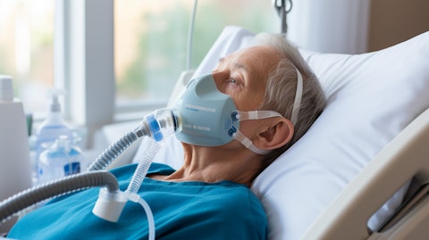 A patient receiving oxygen concentrator treatment for chronic obstructive pulmonary disease.