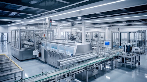 A state-of-the-art manufacturing facility, with robotic arms and conveyor belts for drug production.