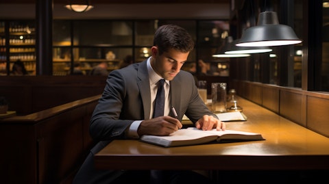 An executive MBA student working late in a study carrel, gaining job-ready skills.