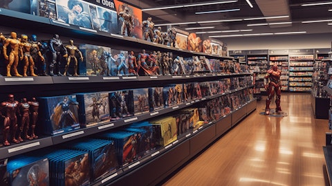 A wide view of an aisle in a specialty retailer, filled with licensed pop culture products, vinyls and action figures.