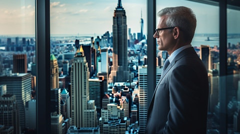 A Senior Executive staring out of the window of a skyscraper, emphasizing the company's leadership in the financial sector.