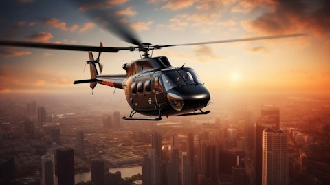 A helicopter in flight over the skyline of a major city.
