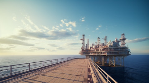 View of an oil & gas exploratory platform, surrounded by a vast expanse of sea & sky.