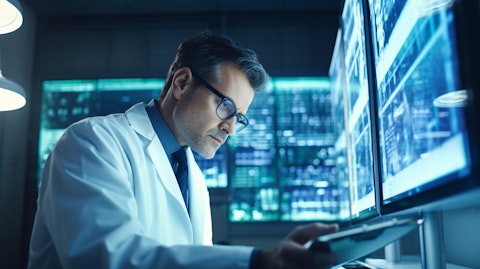 A doctor looking over lab results in a modern hospital setting.