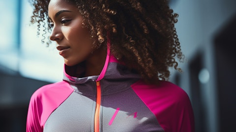 A close-up of a model with activewear apparel products emphasizing the company's lifestyle brand.