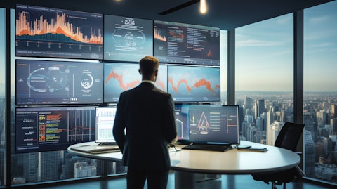 An executive presenting a business proposal in a modern open office space, surrounded by data analytics displays.