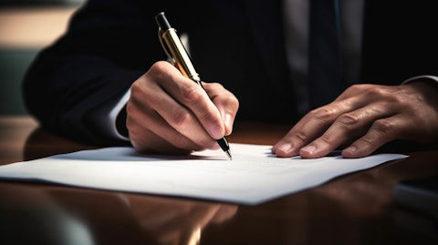 A senior banker signing a loan document, emphasizing the company's ability to finance mortgages.