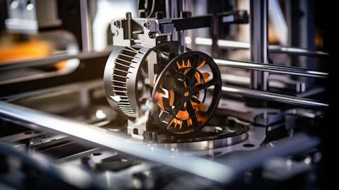 A closeup of a modern 3D printer, showing the intricate detail it can produce.