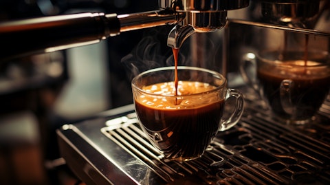 A cup of the company's signature coffee being brewed in a state-of-the-art espresso machine.