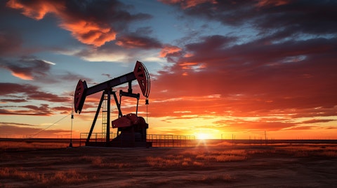A vast oil and gas rig silhouetted in the sunset, capturing the power of Swift Energy Company.