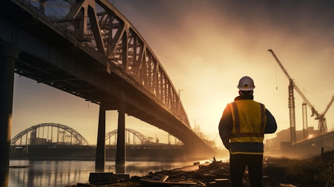 A worker inspecting a newly built bridge, symbolic of the company's engineering prowess.