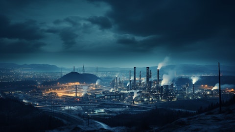 A view of industrial facilities illuminated by the night sky, hinting at the manufacturing capabilities of the coking coal company.