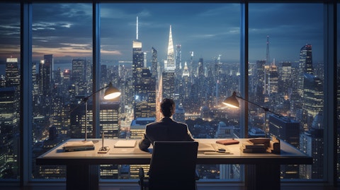 A corporate executive behind a desk in a modern office, examining documents and the skyline beyond.
