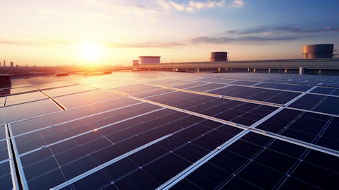 A network of solar panels on the rooftop of a commercial building, creating electricity for places of business.