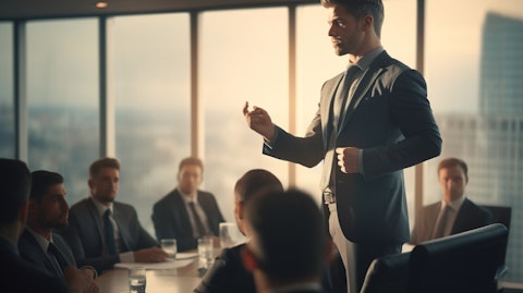 A businessman making a powerful speech in a boardroom, symbolizing the company's successful asset management.