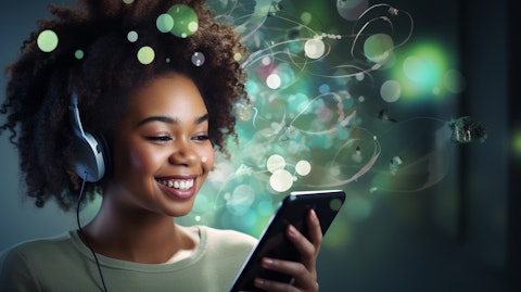 A consumer smiling as they engage with streaming apps and voice platforms.