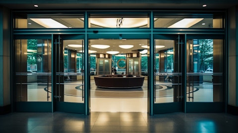 A contemporary banking center, its doors and windows a welcome for customers.