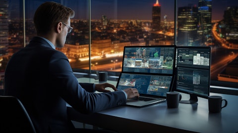 A Chief Information Security Officer (CISO) monitoring the global threat indicators in real-time on their laptop.