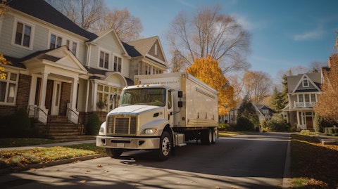 A delivery truck of the company driving through a suburban neighborhood, depicting the company's commitment to providing home-heating services.
