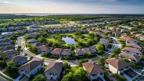 An aerial view of a master-planned community with its wide streets and amenities.
