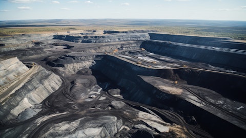 An aerial view of an open cut coal mine, showing the vastness of the company's mining operations.