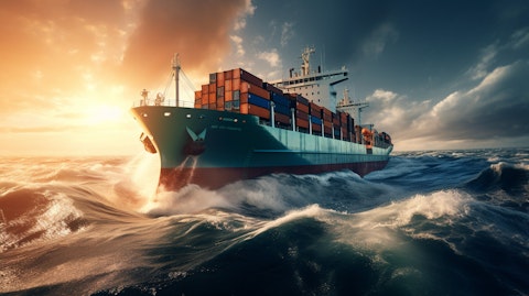 A cargo ship at sea, its journey powered by the wind and waves.