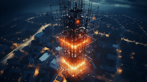 An aerial view of a communication tower with its complex network of wires and cables.