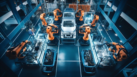 An overhead view of an assembly line producing hydrogen-powered vehicles.