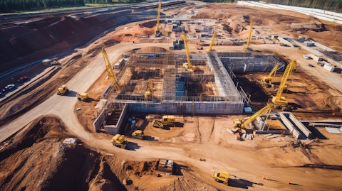 An aerial view of a major construction project, revealing the massive scale of the company's infrastructure construction.
