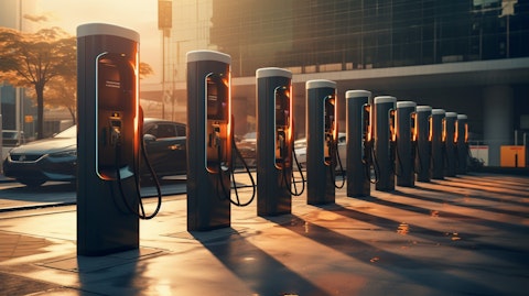 A row of charging stations glowing with the power of the sun ready for public use.