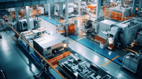 An aerial view of a modern fabrication center with equipment for producing semiconductor components.