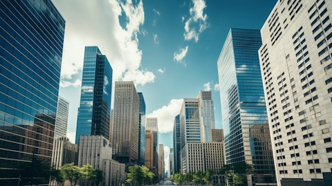 The skyline of a major metropolitan center, dotted with commercial real estate properties.