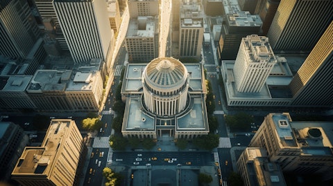 An aerial view of a bustling financial center with a regional bank as the center focal point.